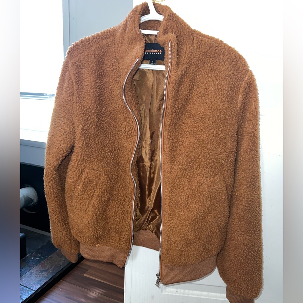 Brown, fuzzy jacket. new condition